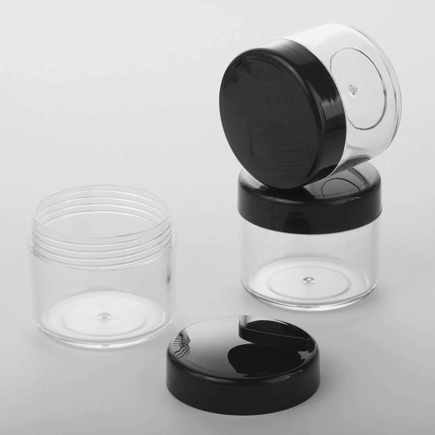 100 Pcs 20g Plastic Sample Cosmetic Containers with Lids and 10 Pcs Mini Makeup Spatula，Refillable Cosmetic Jars Lip Scrub Containers for Skincare - Black